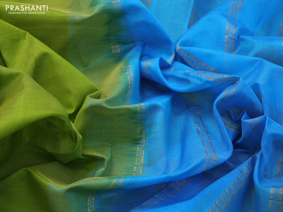Silk cotton saree light green and light blue with plain body and small zari woven border