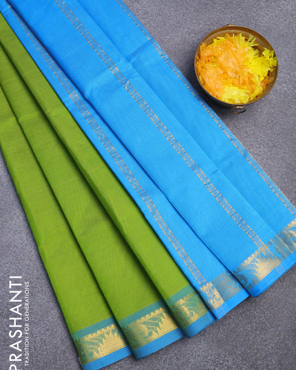 Silk cotton saree light green and light blue with plain body and small zari woven border