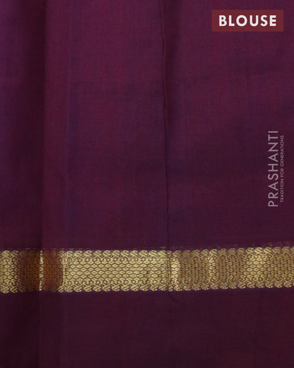 Silk cotton saree dual shade of blue and deep maroon with plain body and zari woven simple border