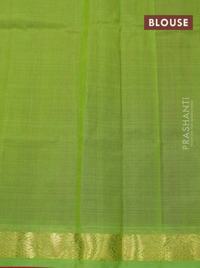 Silk cotton saree maroon and light green with plain body and small zari woven border