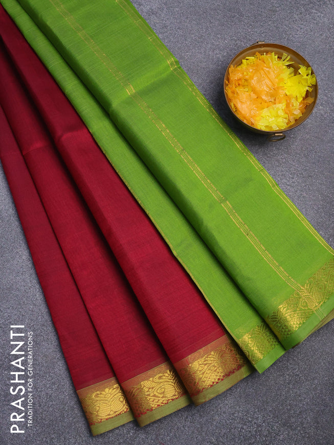 Silk cotton saree dark magenta pink and light green with plain body and small zari woven border