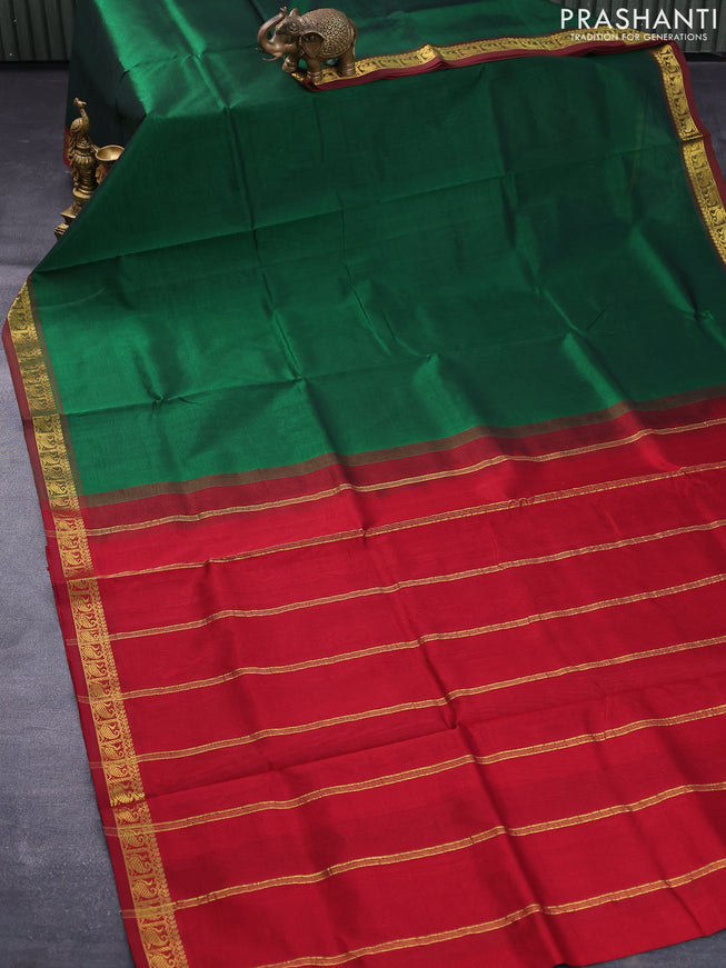 Silk cotton saree green and maroon with plain body and small zari woven border