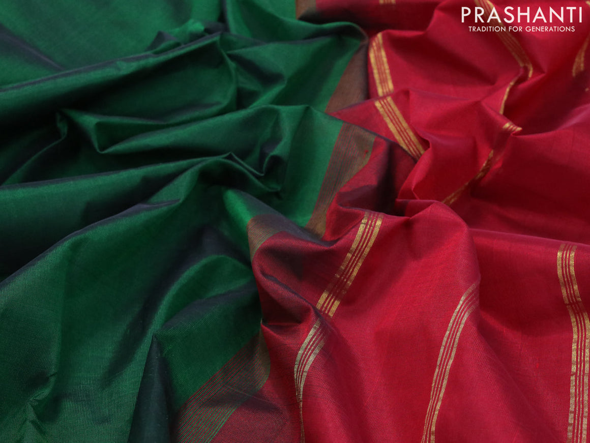 Silk cotton saree green and maroon with plain body and small zari woven border