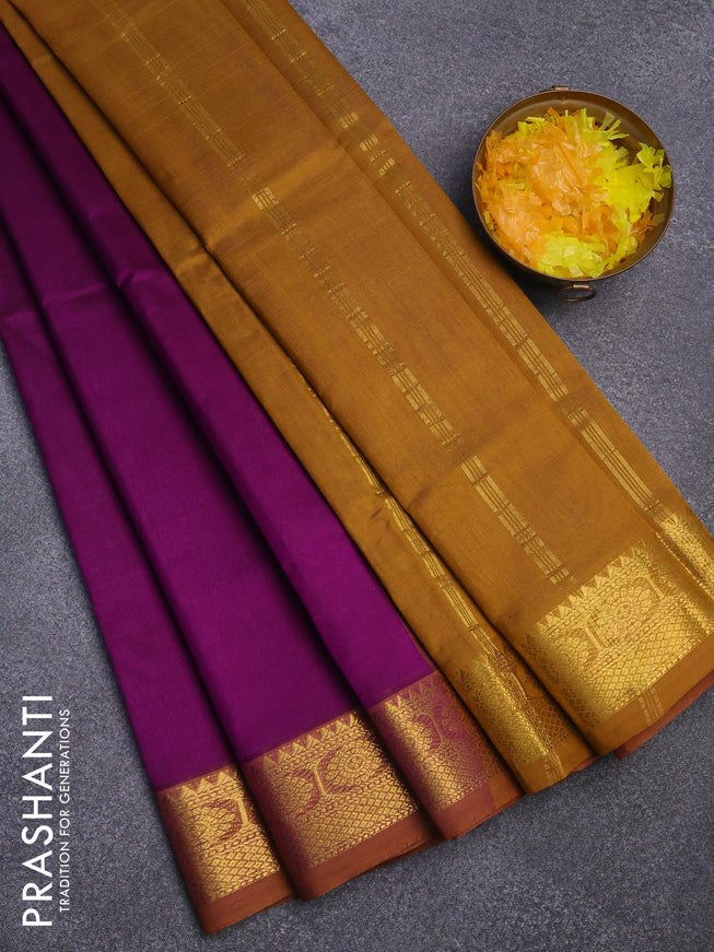Silk cotton saree deep purple and dark mustard with plain body and zari woven border