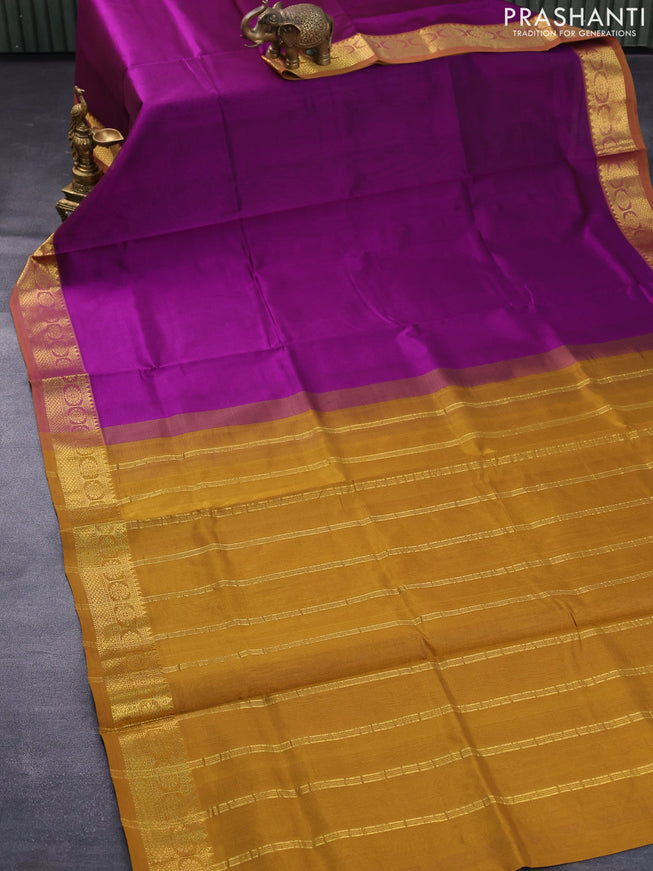 Silk cotton saree deep purple and dark mustard with plain body and zari woven border