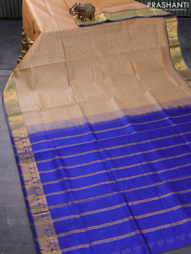 Silk cotton saree sandal and blue with plain body and zari woven border