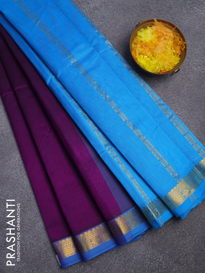 Silk cotton saree deep purple and cs blue with plain body and small zari woven border