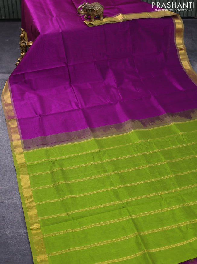 Silk cotton saree deep purple and light green with plain body and small zari woven border