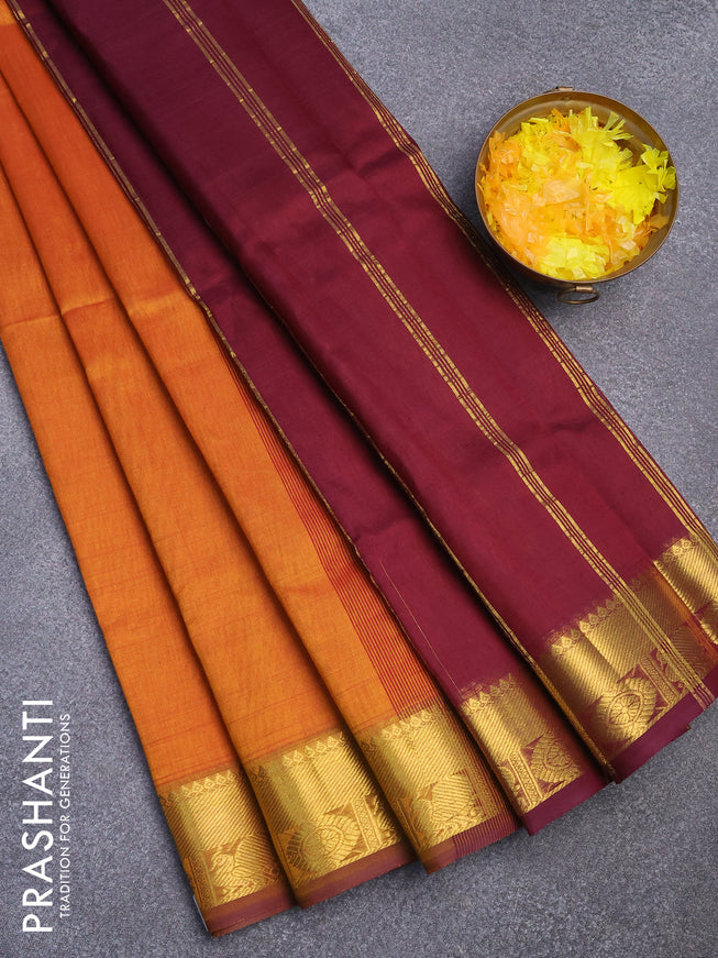 Silk cotton saree dual shade of mustard and wine shade with plain body and zari woven border