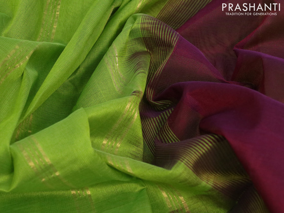 Silk cotton saree deep maroon and light green with plain body and zari woven simple border