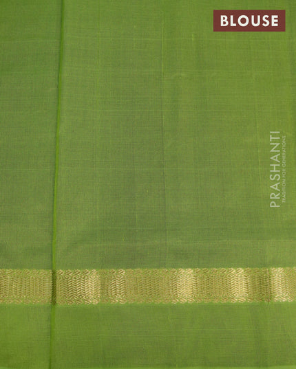 Silk cotton saree deep maroon and light green with plain body and zari woven simple border
