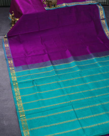 Silk cotton saree deep purple and green with plain body and small zari woven border