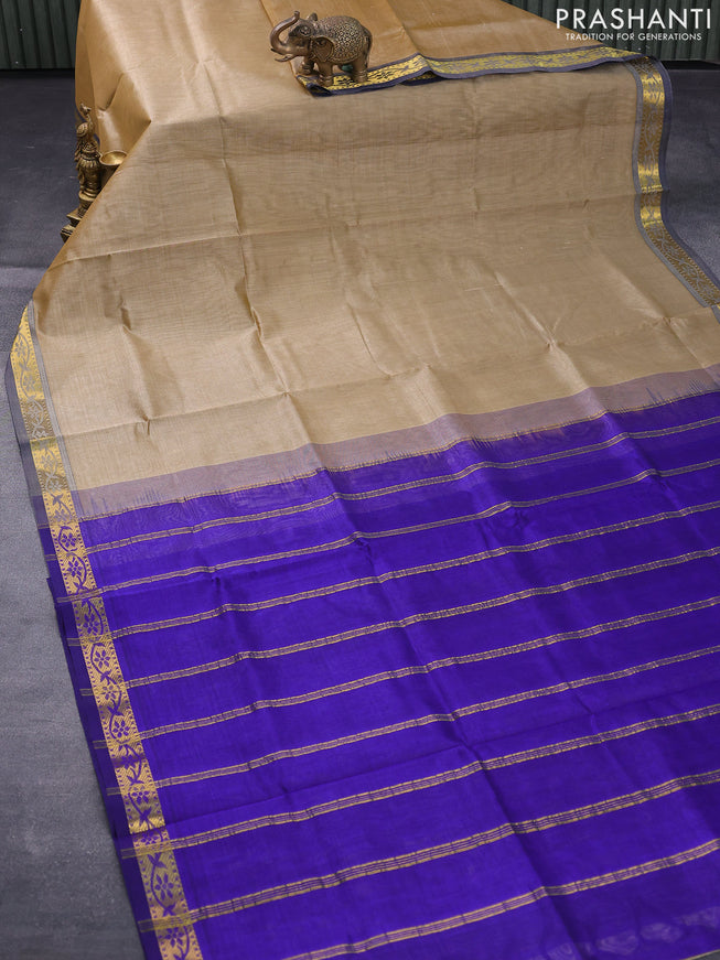 Silk cotton saree dark sandal and blue with plain body and small zari woven border