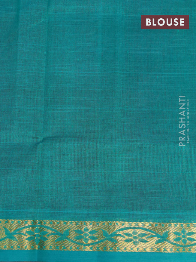 Silk cotton saree dark magenta pink and green with plain body and small zari woven border