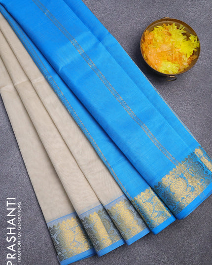 Silk cotton saree off white and cs blue with plain body and annam zari woven border