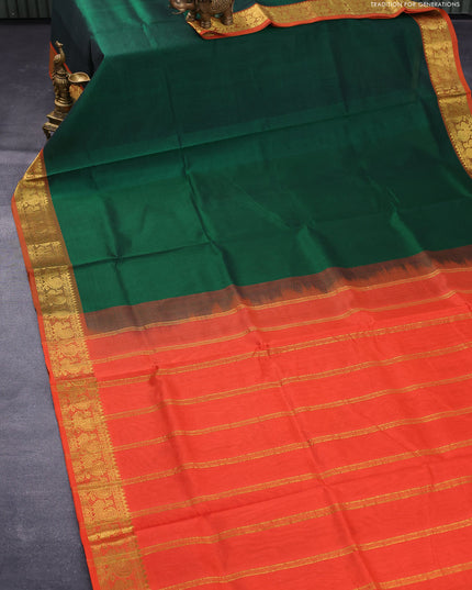 Silk cotton saree dark green and orange with plain body and annam zari woven border