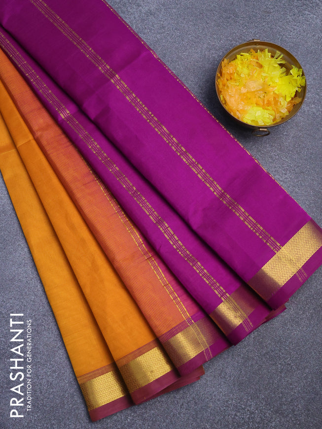 Silk cotton saree mustard yellow and deep purple with plain body and small zari woven border