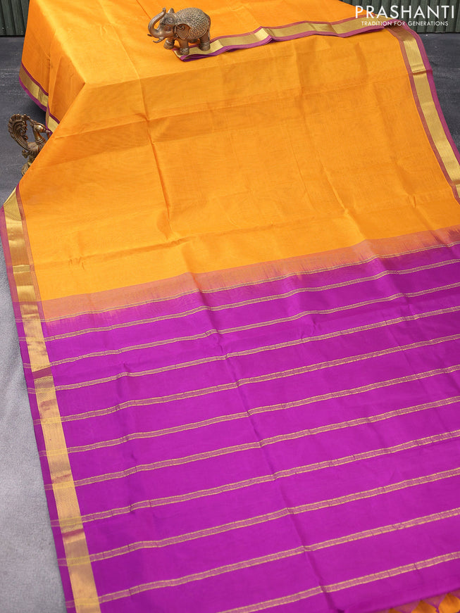 Silk cotton saree mustard yellow and deep purple with plain body and small zari woven border