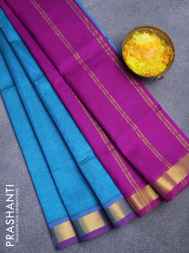 Silk cotton saree cs blue and deep purple with plain body and small zari woven border