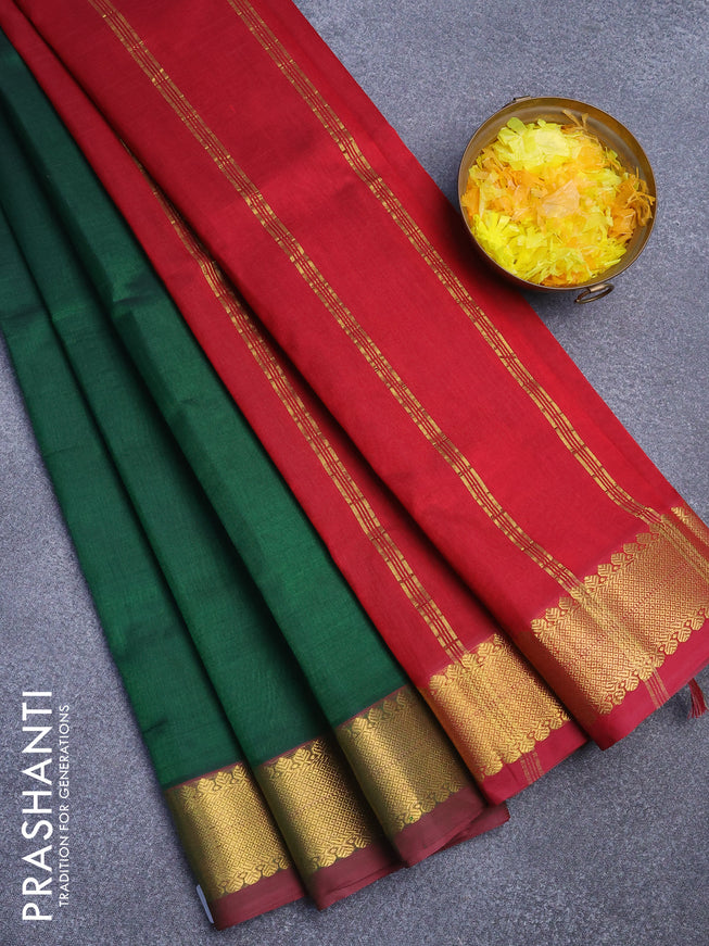 Silk cotton saree green and maroon with plain body and zari woven border