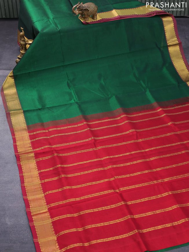 Silk cotton saree green and maroon with plain body and zari woven border