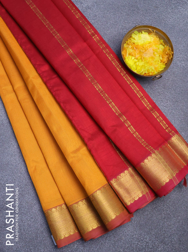Silk cotton saree mango yellow and maroon with plain body and zari woven border