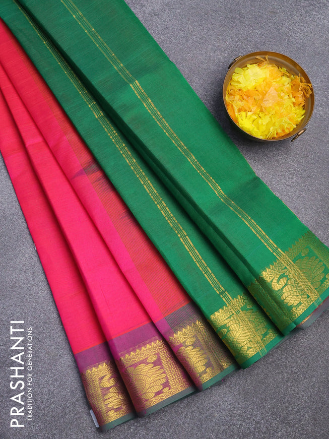Silk cotton saree dual shade of pinkish orange and green with plain body and zari woven border
