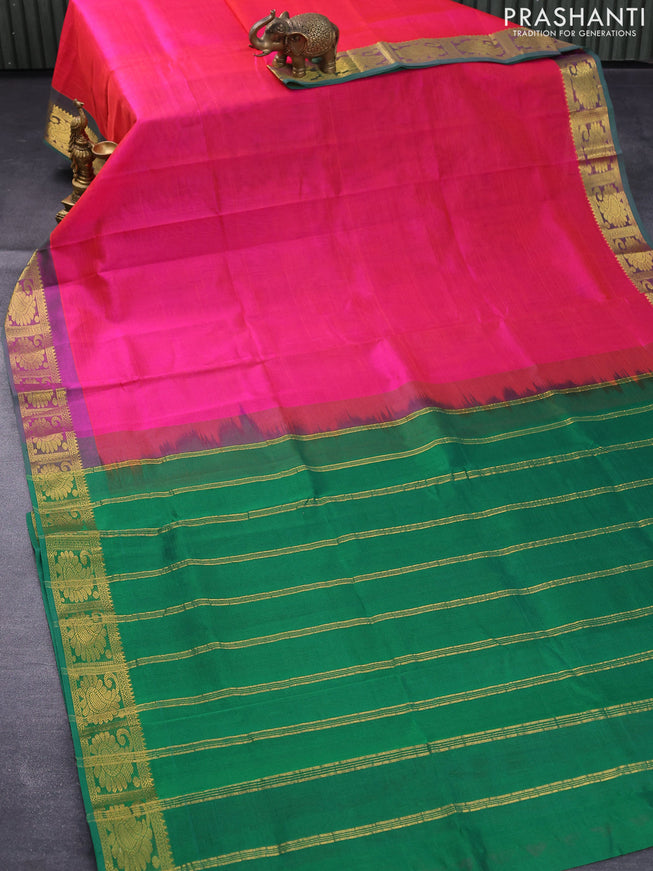 Silk cotton saree dual shade of pinkish orange and green with plain body and zari woven border
