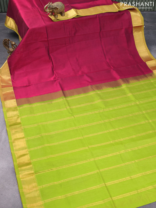 Silk cotton saree dark magenta pink and light green with plain body and zari woven border