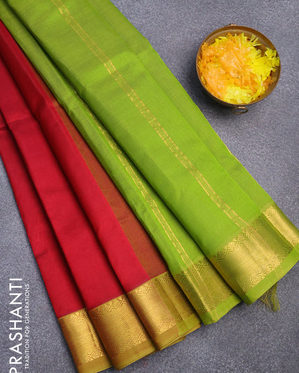 Silk cotton saree maroon and light green with plain body and zari woven border