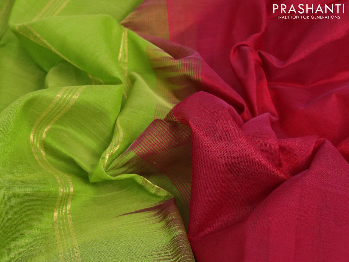 Silk cotton saree maroon and light green with plain body and zari woven border