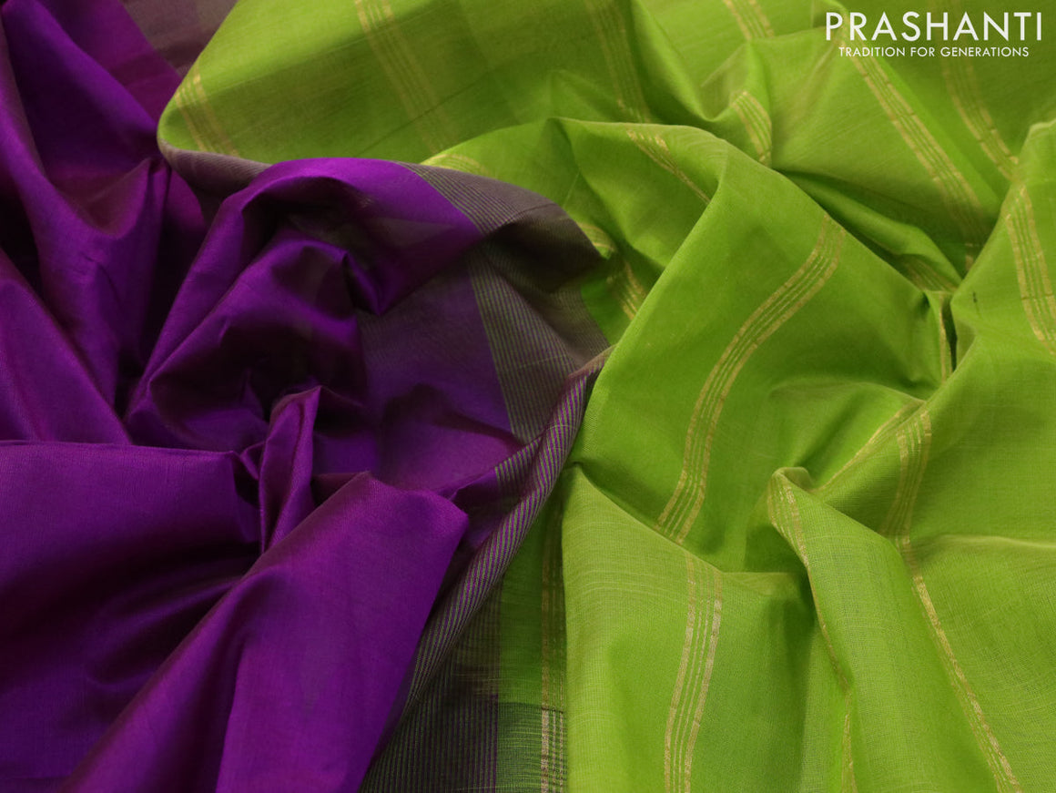 Silk cotton saree purple and light green with plain body and zari woven border
