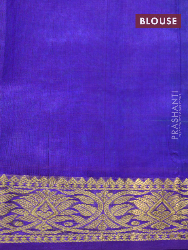 Silk cotton saree teal green and blue with plain body and zari woven border