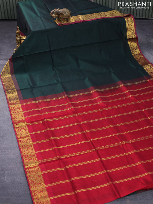Silk cotton saree bottle green and maroon with plain body and zari woven border