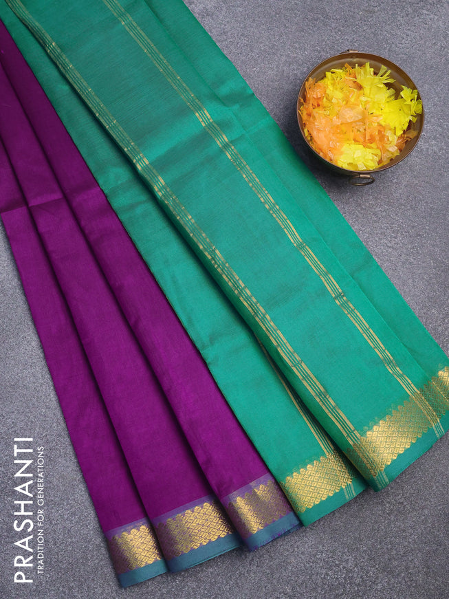 Silk cotton saree purple and green with plain body and small zari woven border