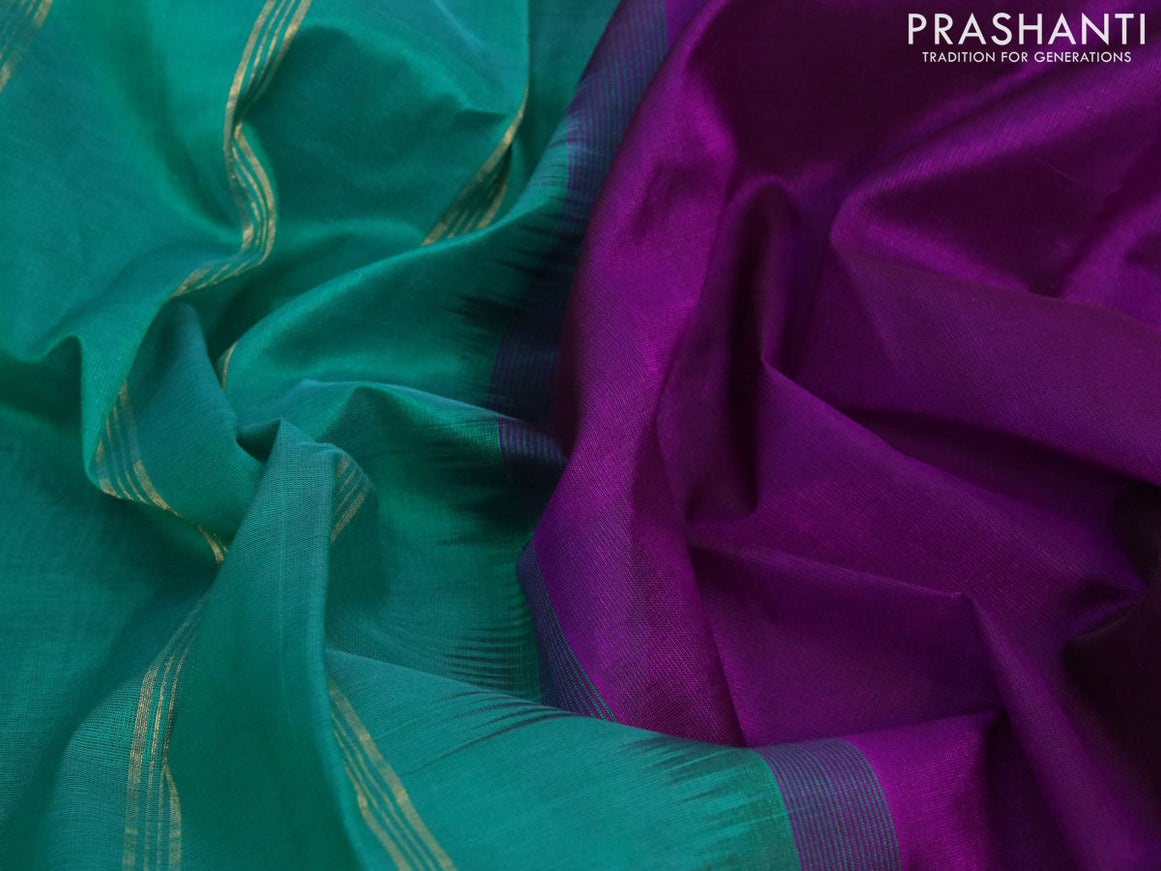 Silk cotton saree purple and green with plain body and small zari woven border