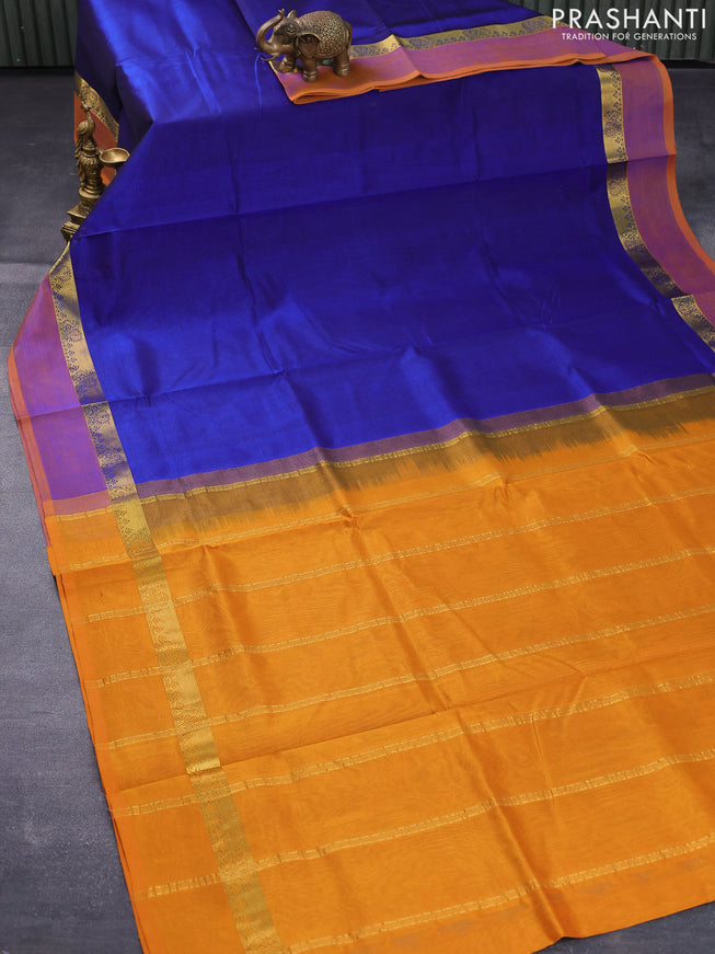 Silk cotton saree blue and mustard yellow with plain body and zari woven simple border