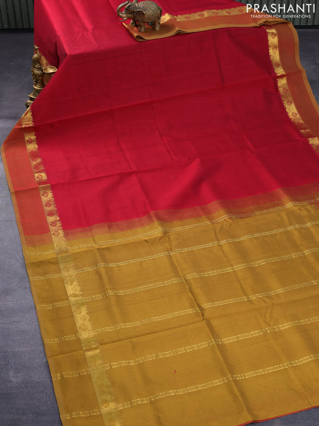 Silk cotton saree maroon and dark mustard with plain body and zari woven simple border