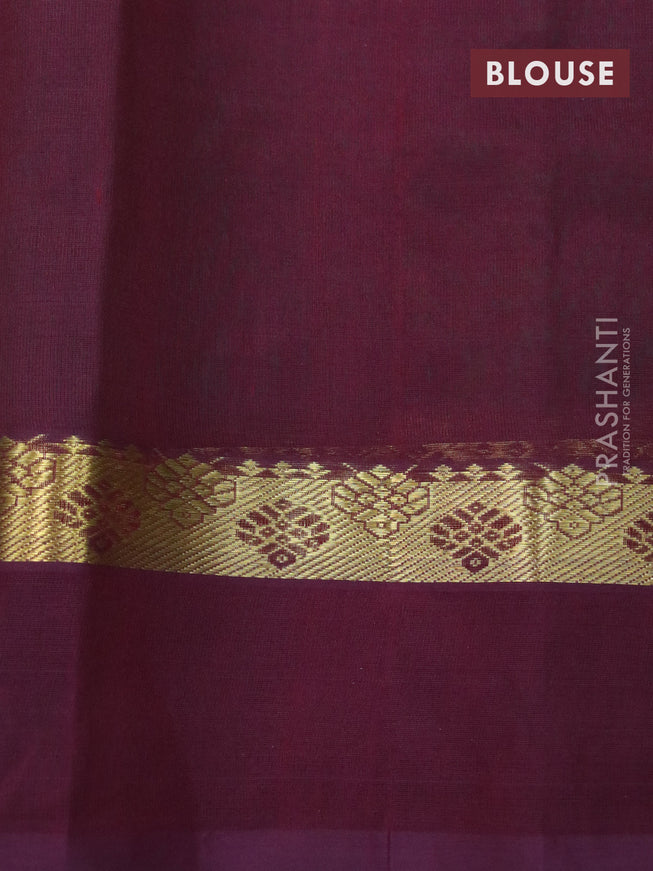 Silk cotton saree dual shade of teal green and wine shade with plain body and zari woven simple border