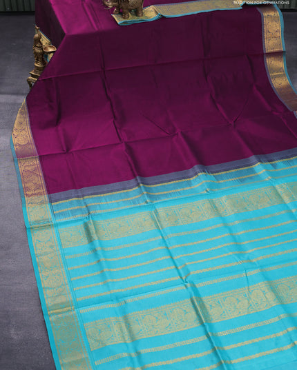 Silk cotton saree deep wine shade and teal blue with plain body and zari woven border