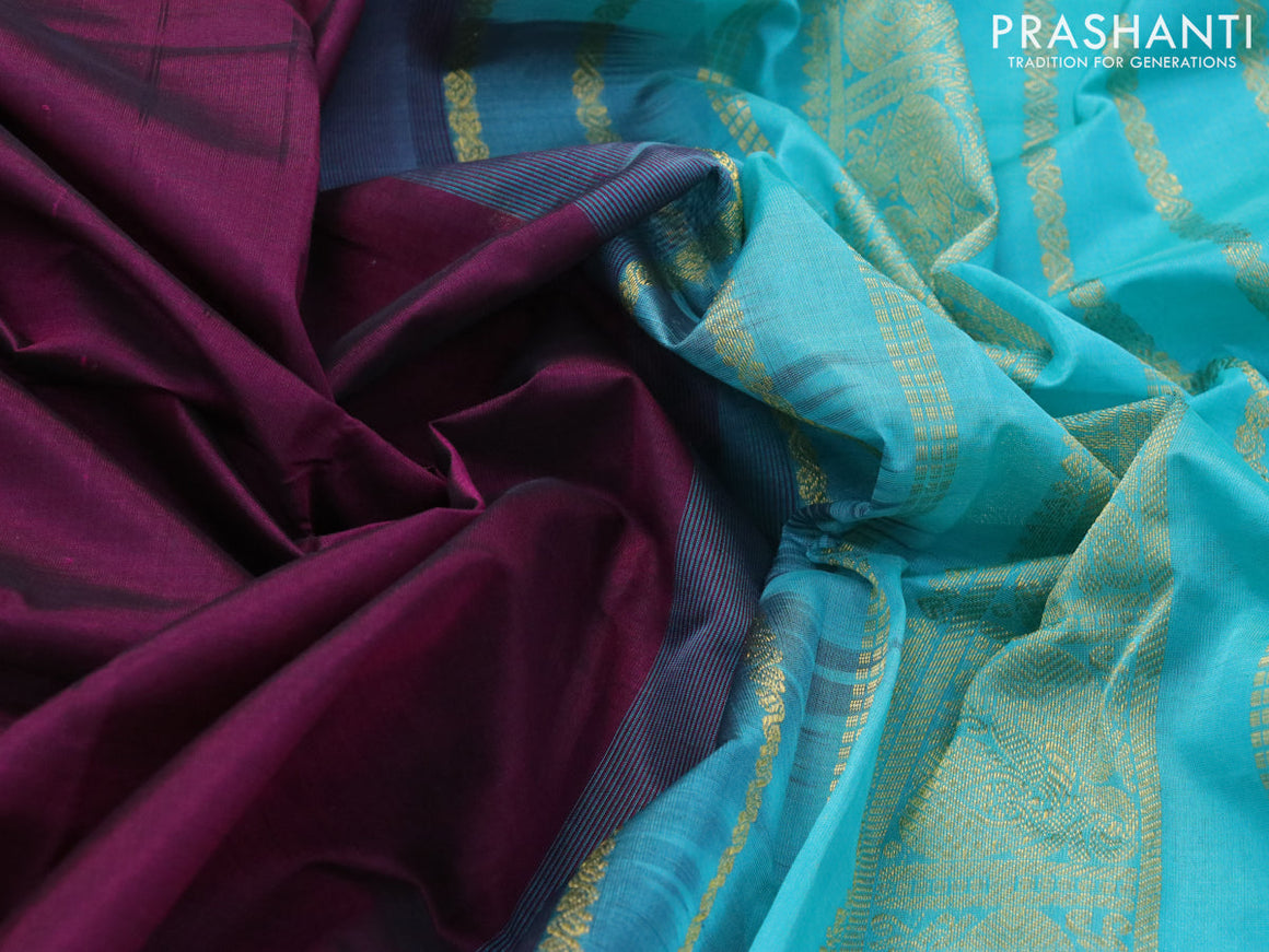 Silk cotton saree deep wine shade and teal blue with plain body and zari woven border