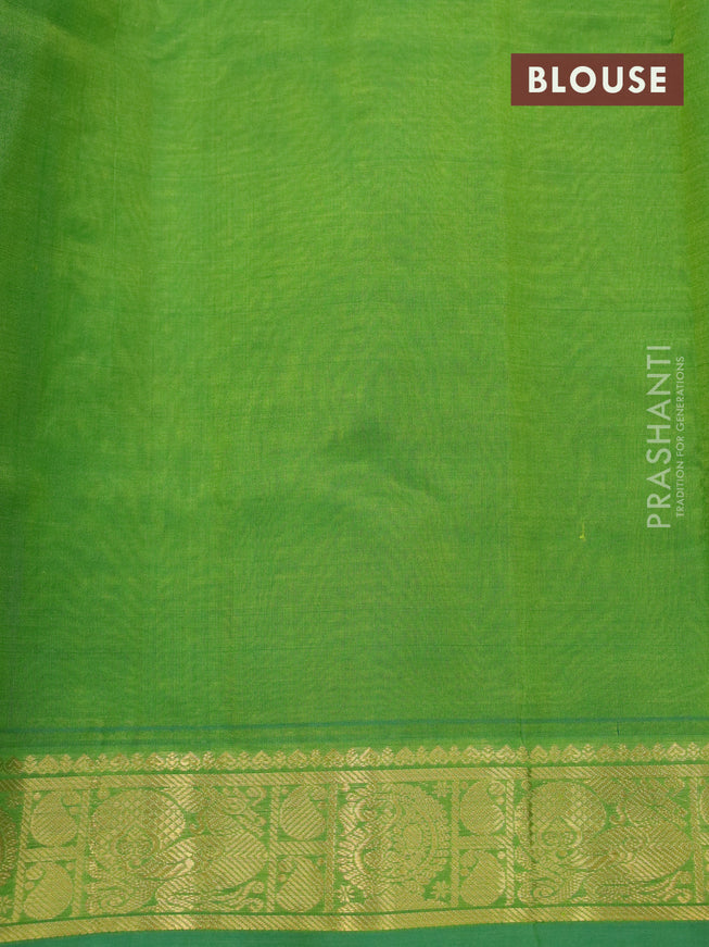 Silk cotton saree blue and green with plain body and zari woven border