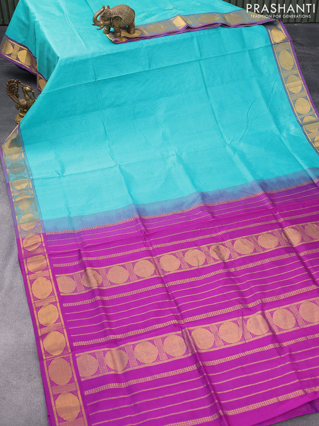 Silk cotton saree teal blue and purple with plain body and rudhraksha zari woven border