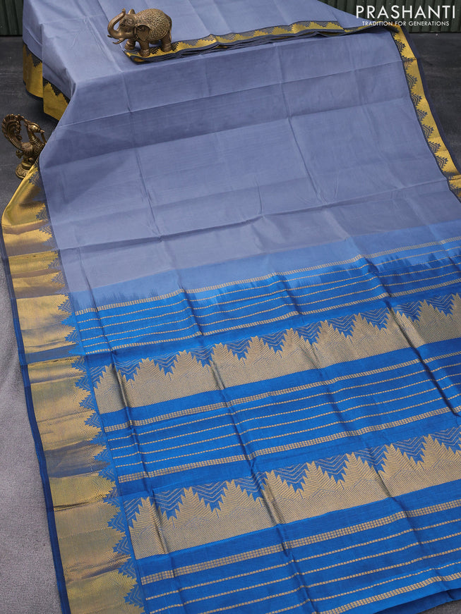 Silk cotton saree pastel grey and cs blue with plain body and temple design zari woven border