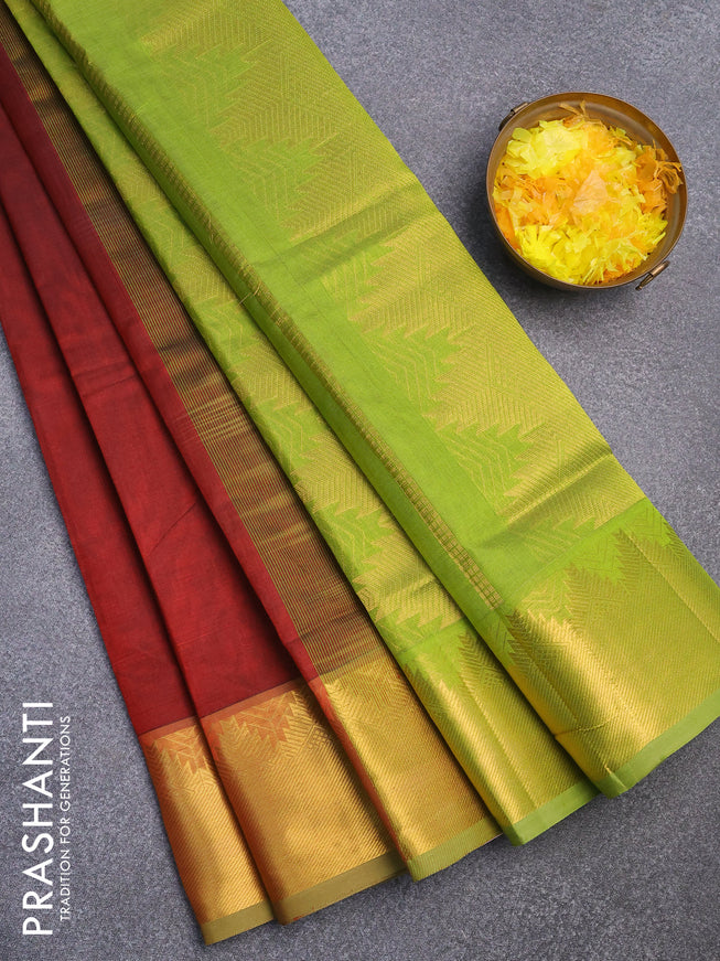 Silk cotton saree maroon and light green with plain body and temple design zari woven border