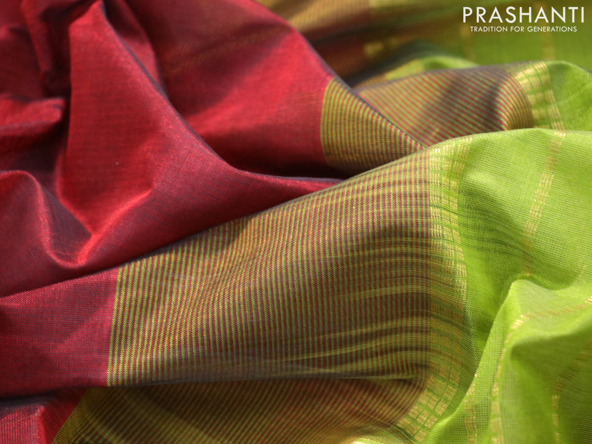 Silk cotton saree maroon and light green with plain body and temple design zari woven border