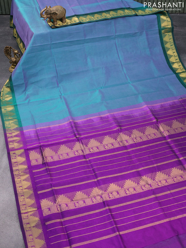 Silk cotton saree dual shade of green and violet with plain body and temple design zari woven border