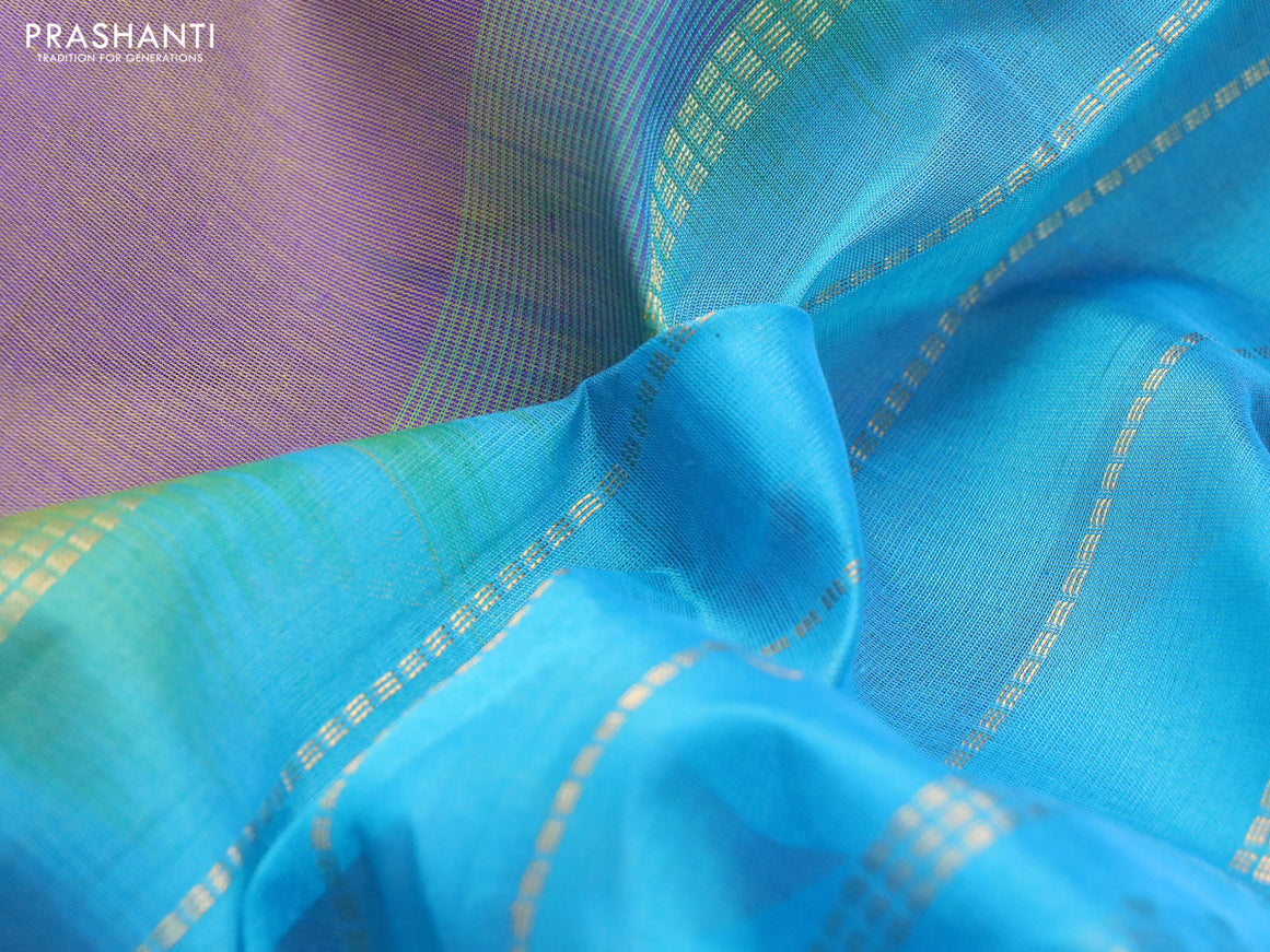 Silk cotton saree dual shade of bluish green and light blue with plain body and zari woven border