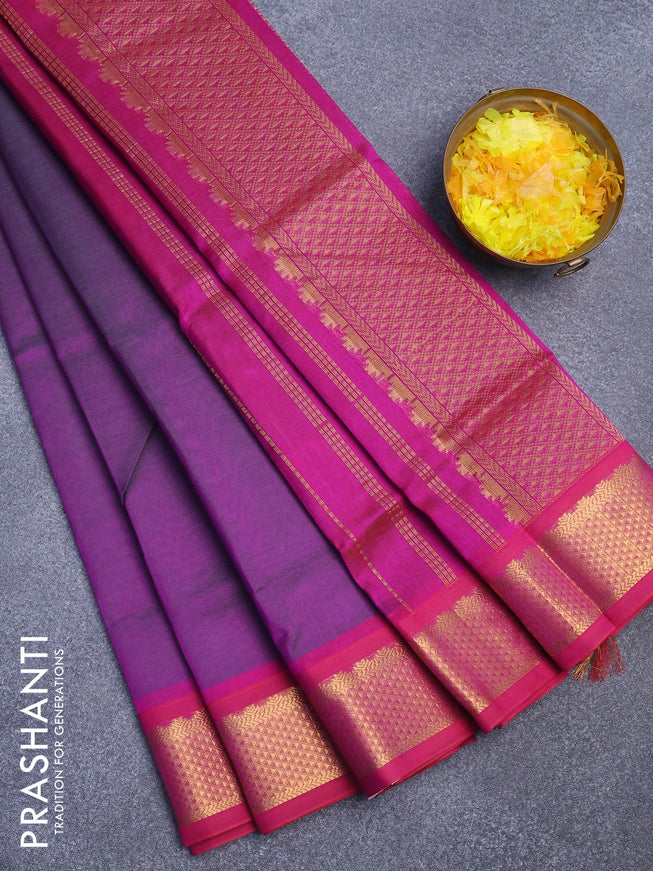 Silk cotton saree dual shade of greenish purple and magenta pink with plain body and zari woven border