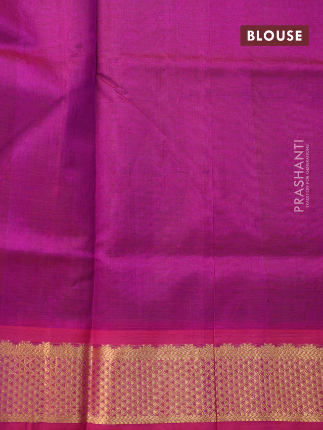 Silk cotton saree dual shade of greenish purple and magenta pink with plain body and zari woven border